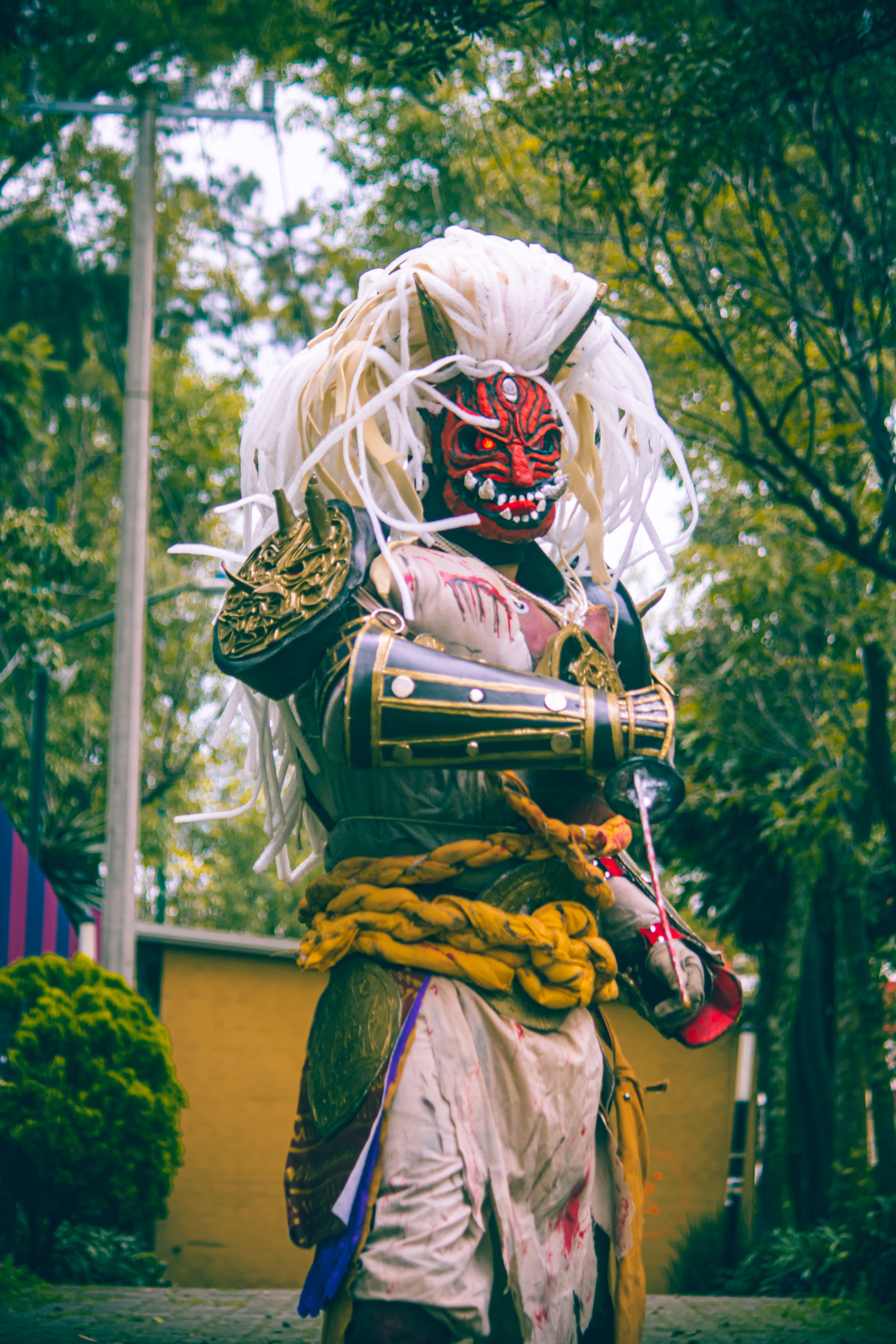 A detailed samurai demon costume photographed outdoors in Mexico City.