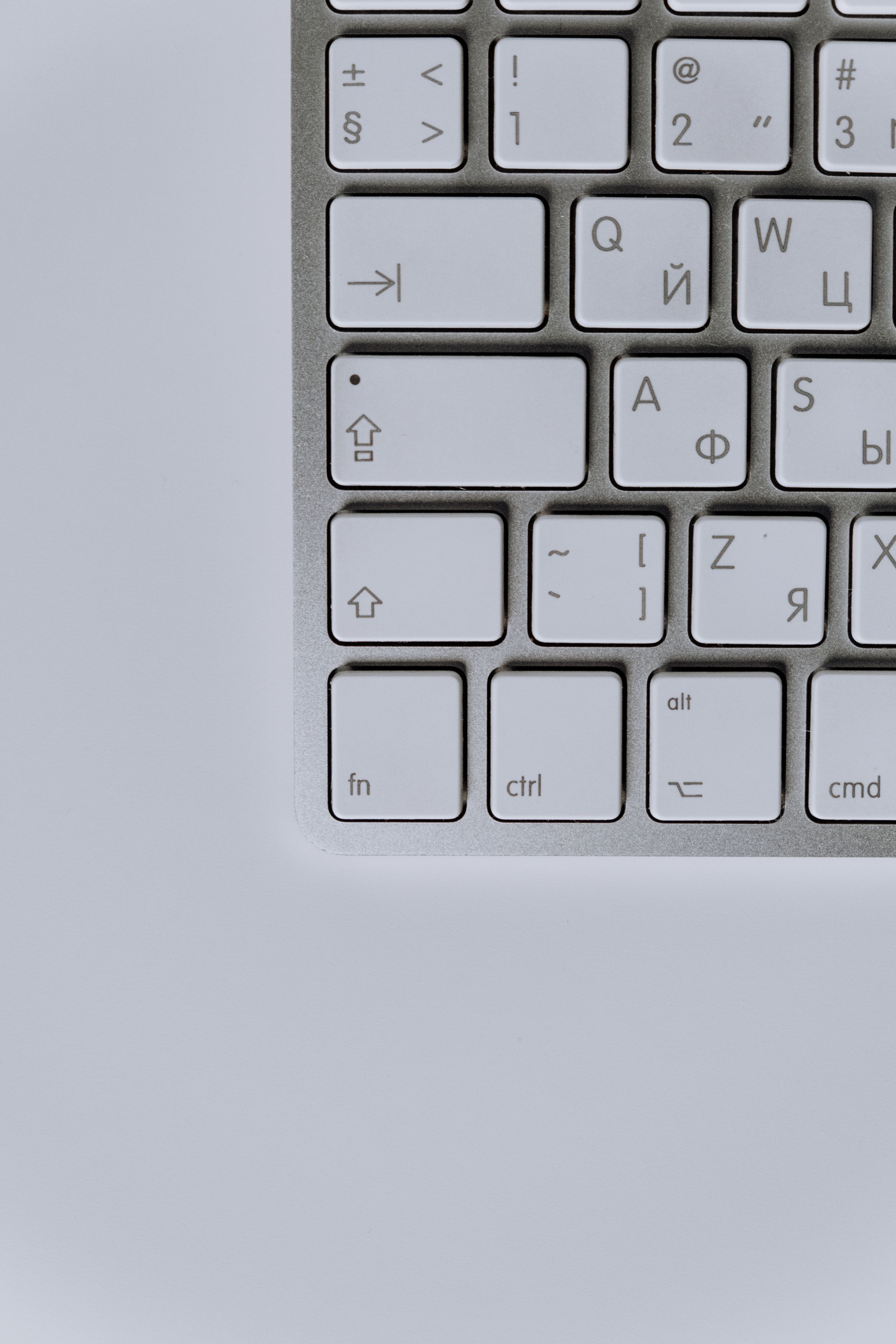 Close-up of a modern wireless keyboard showcasing minimalist design and functionality.